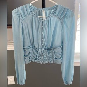 Anthropologie light blue cropped button down blouse.  Size small